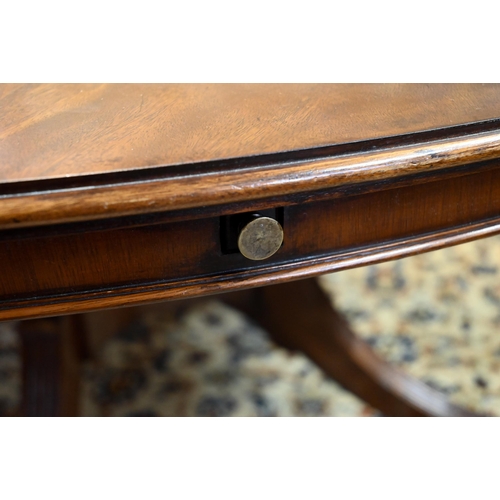 875 - A large George IV style circular extending mahogany dining table by Arthur Brett model 2239 'Mayfair... 