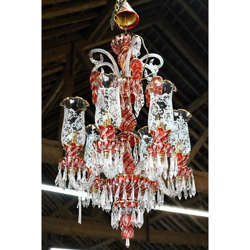 877 - A contemporary Murano style glass, gilt and cranberry glass chandelier / electrolier, with six arms,... 