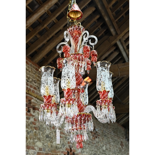 877 - A contemporary Murano style glass, gilt and cranberry glass chandelier / electrolier, with six arms,... 