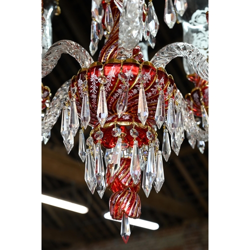 877 - A contemporary Murano style glass, gilt and cranberry glass chandelier / electrolier, with six arms,... 