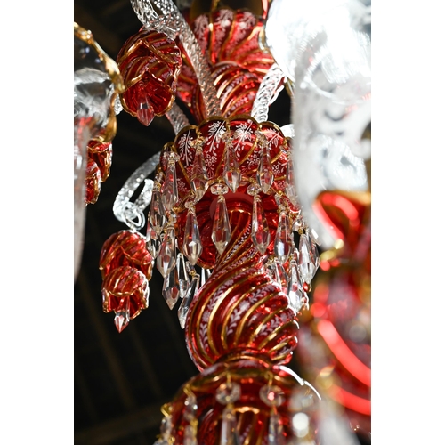 877 - A contemporary Murano style glass, gilt and cranberry glass chandelier / electrolier, with six arms,... 