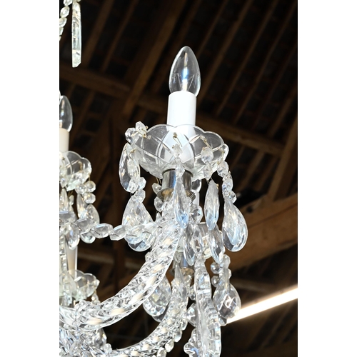 878 - A good contemporary classical design glass electrolier, the twelve arms in two graduated tiers of si... 