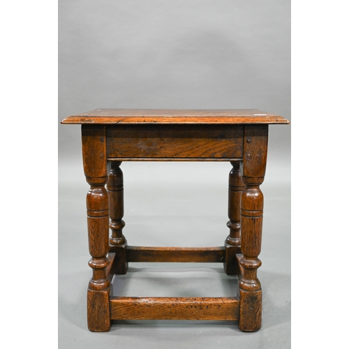 882 - An antique oak joint stool