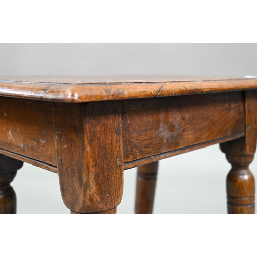 882 - An antique oak joint stool