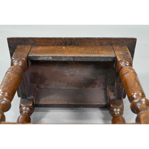 882 - An antique oak joint stool