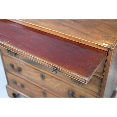 884 - An 18th century mahogany chest with a full width slide over four long graduated drawers, each with (... 