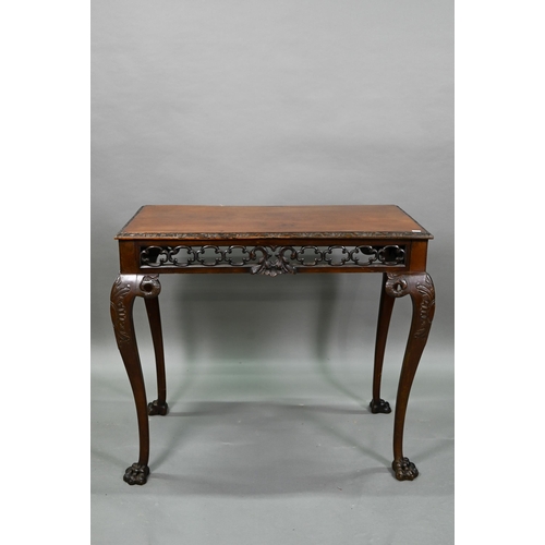 885 - A Regency mahogany small serving table of Irish Chippendale style, the rectangular top with moulded ... 