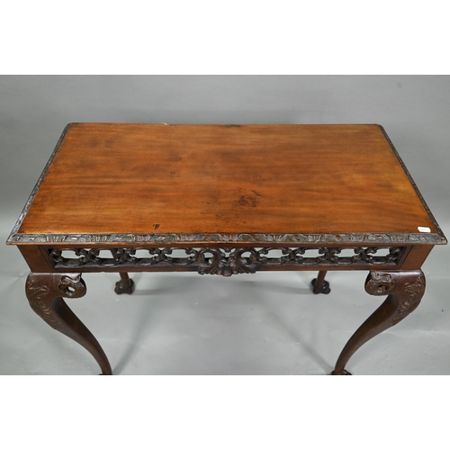 885 - A Regency mahogany small serving table of Irish Chippendale style, the rectangular top with moulded ... 