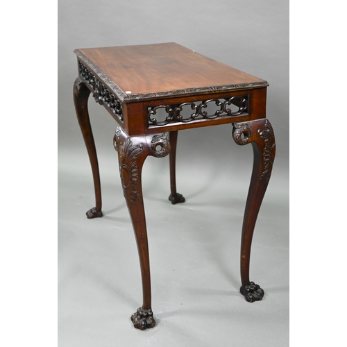 885 - A Regency mahogany small serving table of Irish Chippendale style, the rectangular top with moulded ... 