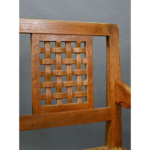 912 - The workshop of Robert Thompson (Kilburn) a companion pair of 'Mouseman' oak carver chairs with latt... 