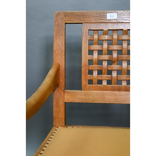 912 - The workshop of Robert Thompson (Kilburn) a companion pair of 'Mouseman' oak carver chairs with latt... 