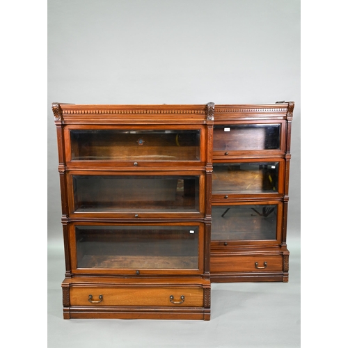 917 - A companion pair of mahogany Globe Wernicke library bookcases, each with moulded tops over three gra... 