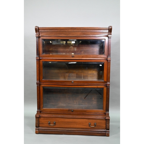 917 - A companion pair of mahogany Globe Wernicke library bookcases, each with moulded tops over three gra... 