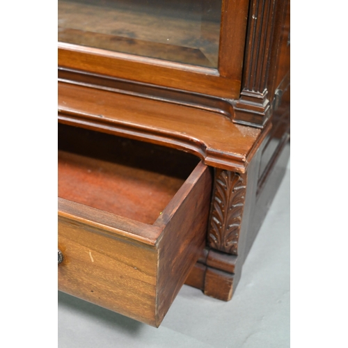 917 - A companion pair of mahogany Globe Wernicke library bookcases, each with moulded tops over three gra... 