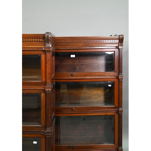 917 - A companion pair of mahogany Globe Wernicke library bookcases, each with moulded tops over three gra... 