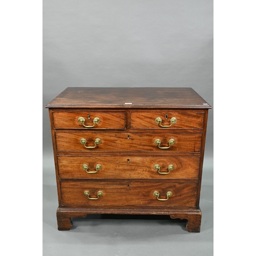 923 - A George III mahogany chest four long graduated drawers, with brass swan-neck fittings, raised on sh... 