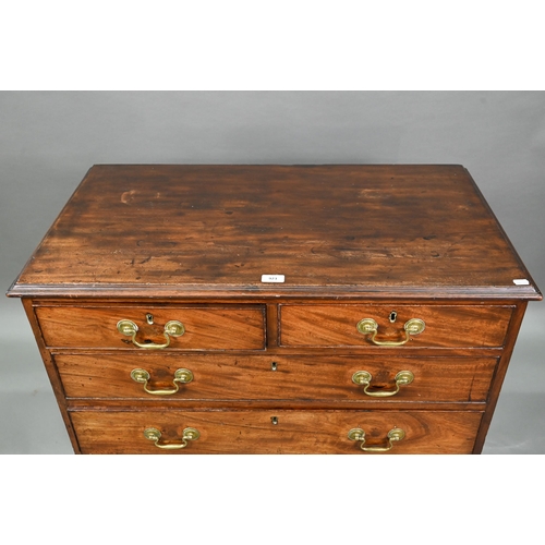 923 - A George III mahogany chest four long graduated drawers, with brass swan-neck fittings, raised on sh... 