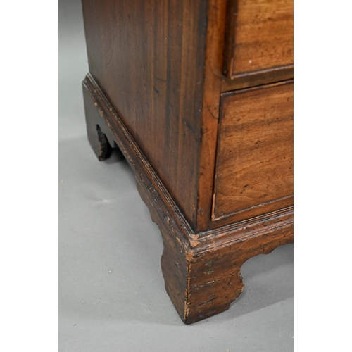 923 - A George III mahogany chest four long graduated drawers, with brass swan-neck fittings, raised on sh... 