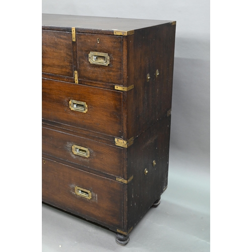 924 - A Victorian brass bound teak campaign secretaire chest, in two parts, centred by a fitted fall front... 