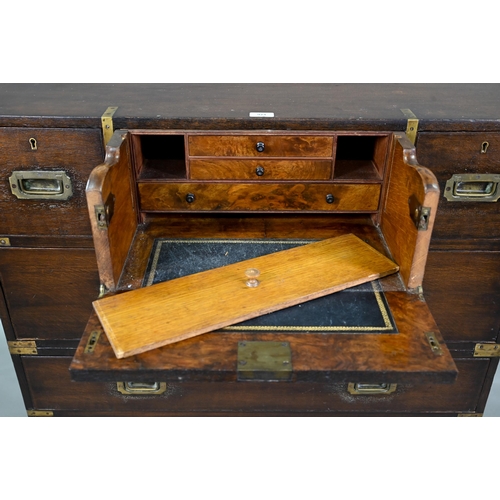 924 - A Victorian brass bound teak campaign secretaire chest, in two parts, centred by a fitted fall front... 