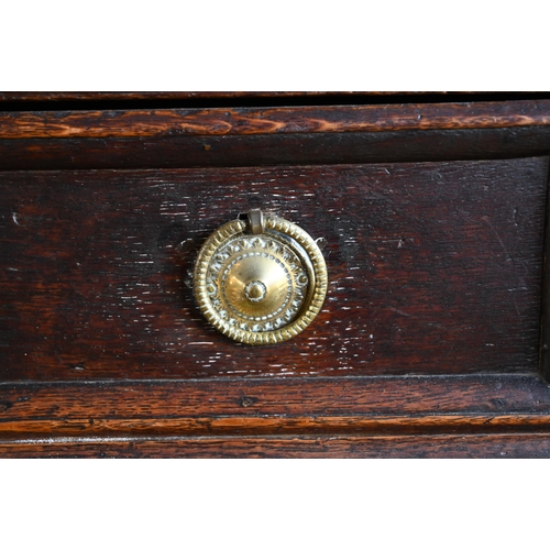 925 - An antique oak low dresser with three double moulded front drawers over a triple arched apron, raise... 