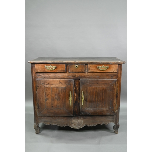 928 - An antique provincial French oak cupboard, Normandy, with three drawers over a pair of mitre framed ... 