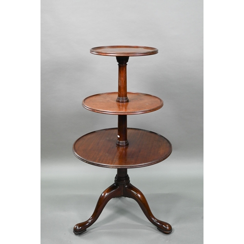 934 - A Victorian mahogany dumb waiter, the graduated three circular tiers raised on a tripod base to bras... 