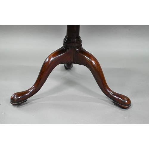 934 - A Victorian mahogany dumb waiter, the graduated three circular tiers raised on a tripod base to bras... 