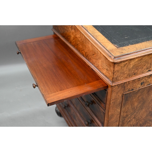 935 - A William IV burr walnut davenport, stamped T. Wilson, London, the sliding slope top with 3/4 spindl... 