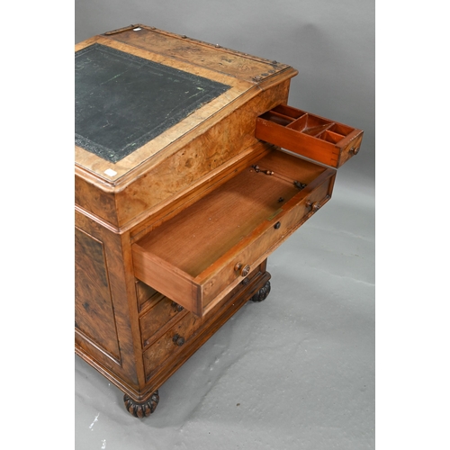 935 - A William IV burr walnut davenport, stamped T. Wilson, London, the sliding slope top with 3/4 spindl... 