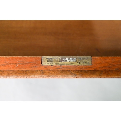 935 - A William IV burr walnut davenport, stamped T. Wilson, London, the sliding slope top with 3/4 spindl... 