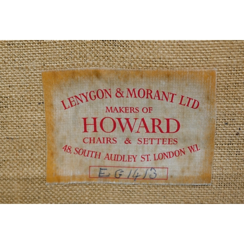 940 - A Lenygon & Morant Ltd, Howard armchair in green H&S monogrammed covers, raised on concealed... 