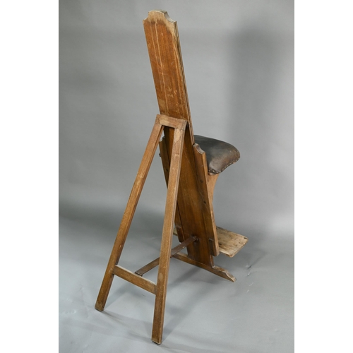 941 - Roberson & Co. London, an antique artists 'donkey' easel, with folding studded brown leather sea... 