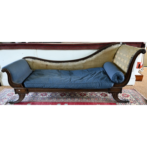 942 - A Regency mahogany framed chaise lounge, the moulded scrolled ends raised on out-splay legs (previou... 