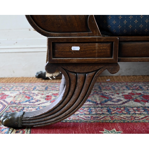 942 - A Regency mahogany framed chaise lounge, the moulded scrolled ends raised on out-splay legs (previou... 