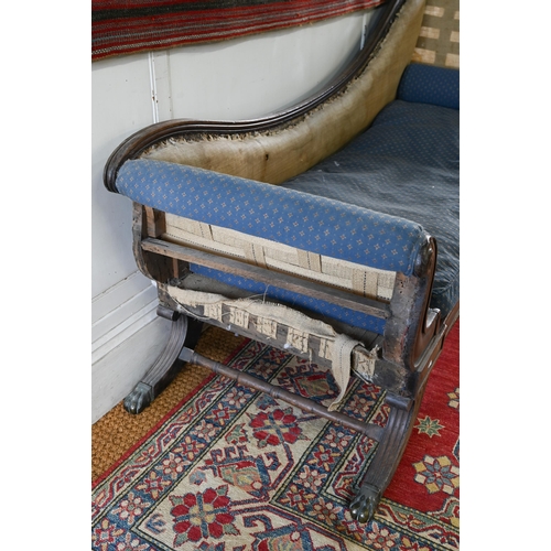 942 - A Regency mahogany framed chaise lounge, the moulded scrolled ends raised on out-splay legs (previou... 