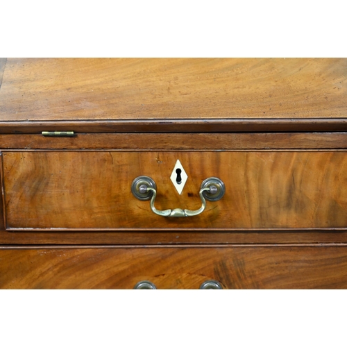 944 - A mahogany bureau bookcase, the upper with pair of diamond glazed enclosing adjustable shelves, the ... 