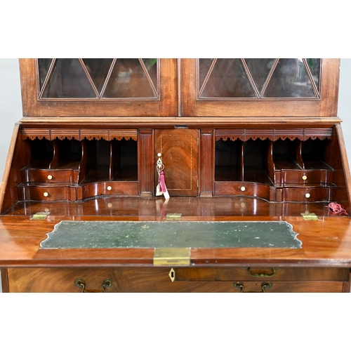 944 - A mahogany bureau bookcase, the upper with pair of diamond glazed enclosing adjustable shelves, the ... 