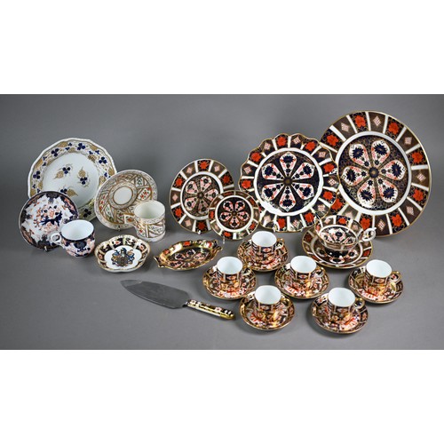 593 - A set of six Royal Crown Derby Imari coffee cans and saucers, 1927, to/w an Imari trio 1976, a 22 cm... 