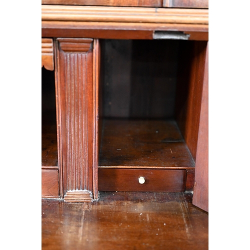 944 - A mahogany bureau bookcase, the upper with pair of diamond glazed enclosing adjustable shelves, the ... 