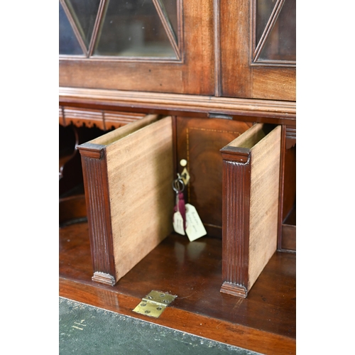 944 - A mahogany bureau bookcase, the upper with pair of diamond glazed enclosing adjustable shelves, the ... 