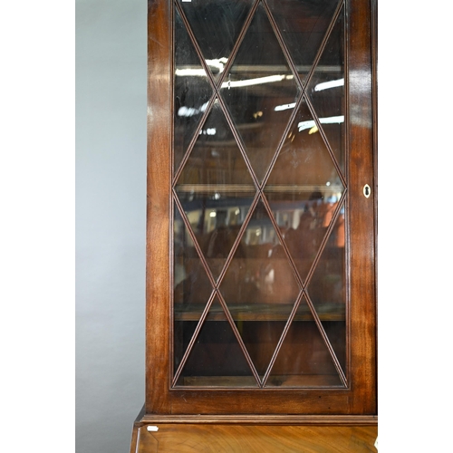 944 - A mahogany bureau bookcase, the upper with pair of diamond glazed enclosing adjustable shelves, the ... 