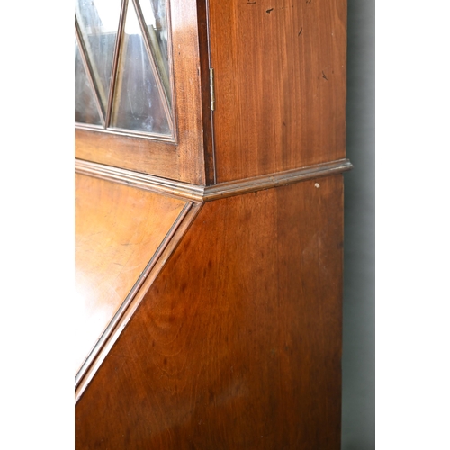 944 - A mahogany bureau bookcase, the upper with pair of diamond glazed enclosing adjustable shelves, the ... 