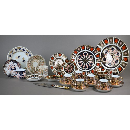 593 - A set of six Royal Crown Derby Imari coffee cans and saucers, 1927, to/w an Imari trio 1976, a 22 cm... 