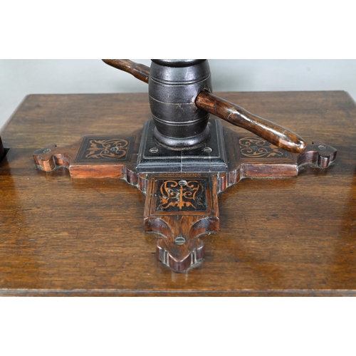 946 - An antique oak, walnut and marquetry book press, with two frieze drawers, raised on four bulbous sup... 