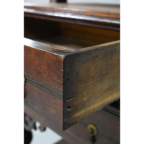 946 - An antique oak, walnut and marquetry book press, with two frieze drawers, raised on four bulbous sup... 