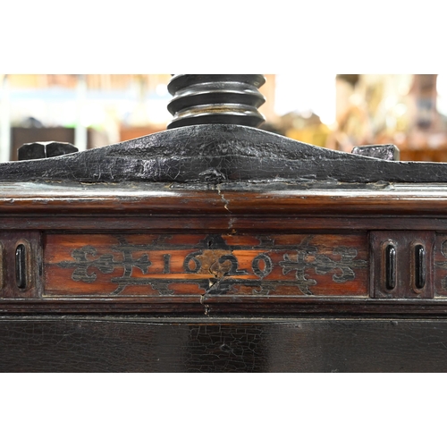 946 - An antique oak, walnut and marquetry book press, with two frieze drawers, raised on four bulbous sup... 