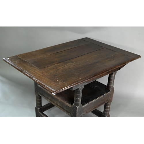 947 - A Charles I jointed oak box-seat table-chair, circa 1640, having a pivotal boarded top/back with cle... 