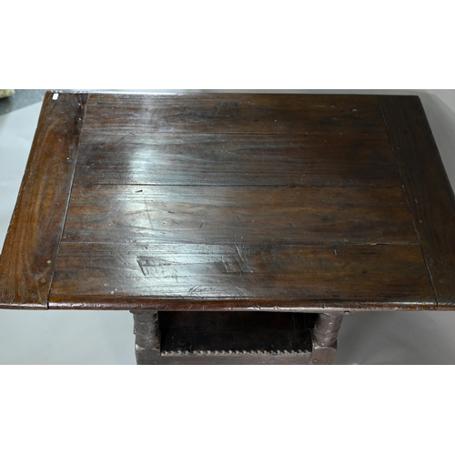 947 - A Charles I jointed oak box-seat table-chair, circa 1640, having a pivotal boarded top/back with cle... 