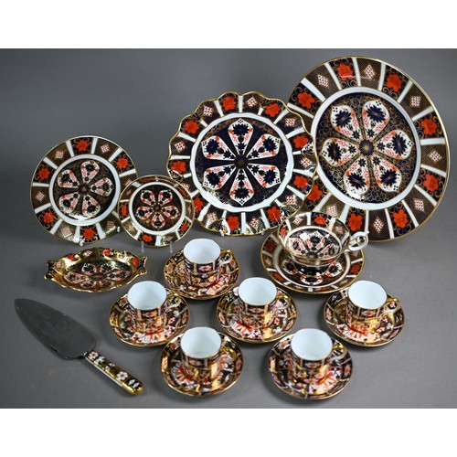 593 - A set of six Royal Crown Derby Imari coffee cans and saucers, 1927, to/w an Imari trio 1976, a 22 cm... 